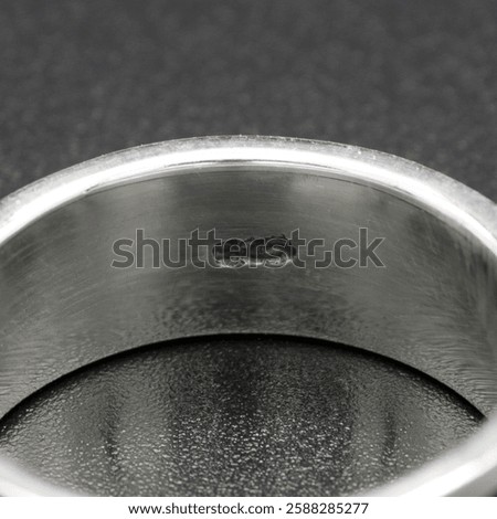 Close-up of the reverse side of a 925 silver ring, showcasing its hallmark and fine craftsmanship. Ideal for showcasing ring designs or promoting high-quality silver jewelry with authenticity