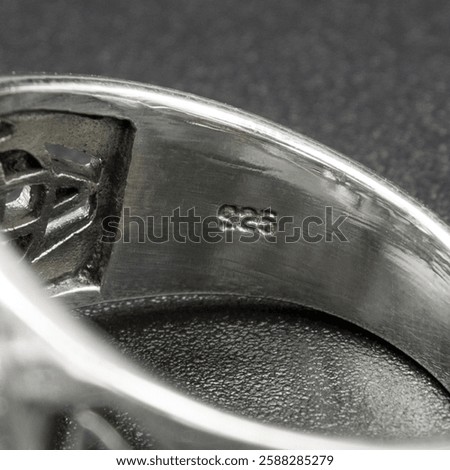 Close-up of the reverse side of a 925 silver ring, showcasing its hallmark and fine craftsmanship. Ideal for showcasing ring designs or promoting high-quality silver jewelry with authenticity