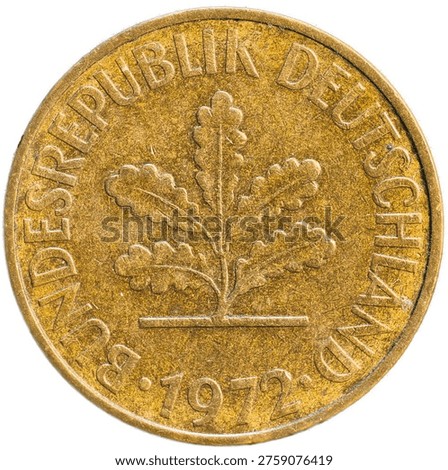 Close-up of the reverse side of a German 10 Pfennig coin from 1972 featuring the oak seedling design and inscription “Bundesrepublik Deutschland”. Isolated macro shot on white background.