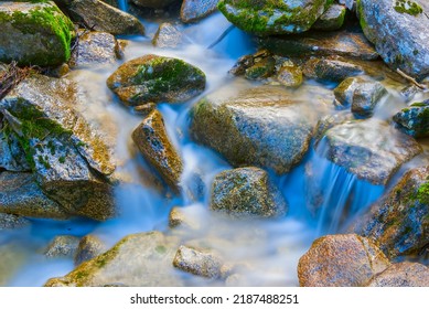 Closeup River Rushing In Mountain Forest