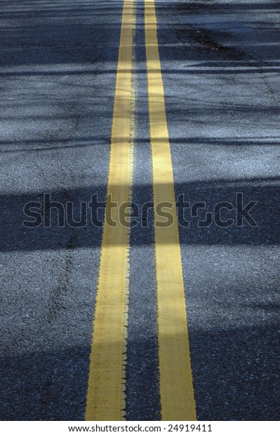 Closeup of the road dividing\
line