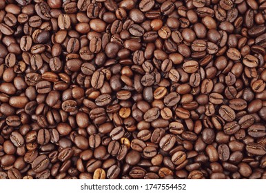 Closeup of roasted coffee beans - Shutterstock ID 1747554452