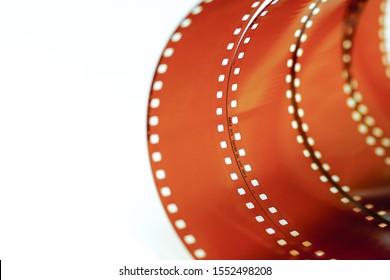 Close-up of a roll 35 mm photographic film.film 35mm close-up abstract on white background. - Powered by Shutterstock