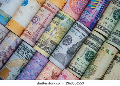 Closeup rolled of variety banknote around the world. Exchange rate and Forex investment concept.-Image. - Shutterstock ID 1368556553