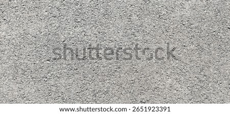 Close-up of rough asphalt texture