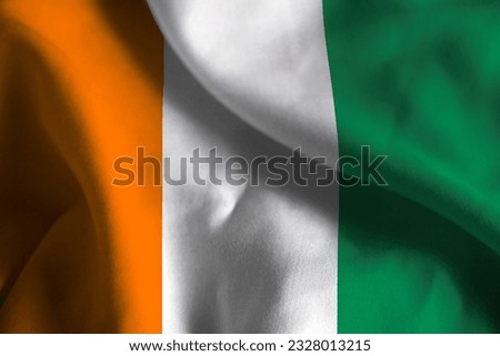 Close-up of a Ruffled Cote d Ivoire Flag, Cote d Ivoire Fabric Flag Waving in the Wind