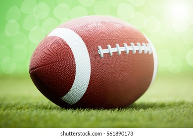 Close-up Of Rugby Ball On Grassy Field