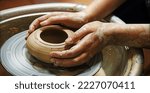 Closeup rural bible god male artisan worker dirty arm touch tool teach ancient retro old earthen culture water mug pitcher vessel ware. Rustic antique wet hobby table girl learn make pan dish design