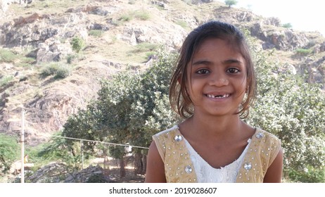 A Closeup Of A Rural Girl With A Genuine Smile On Her Face, India 