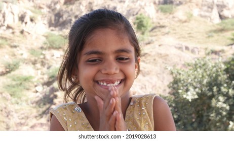 A Closeup Of A Rural Girl With A Genuine Smile On Her Face, India 