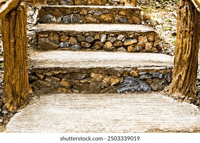 Close-up of rustic stone staircase with wooden handrails, set in natural environment. Adventure, hiking, and rustic landscapes. Advertising, marketing and product presentation - Powered by Shutterstock