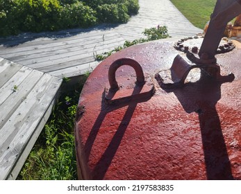 A closeup of a rusty hookup on a large buoy. - Shutterstock ID 2197583835