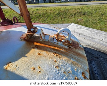 A closeup of a rusty hookup on a large buoy. - Shutterstock ID 2197583839