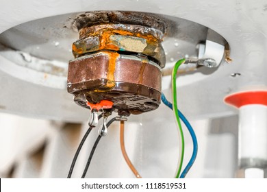 Closeup Of A Rusty And Leaking Water Heater 