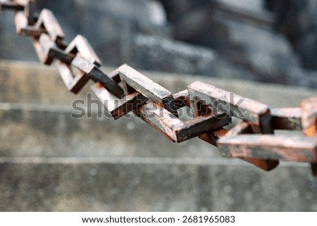 Closeup of rusty rectangular chain links