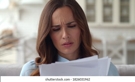 Closeup Sad Business Woman Reading Documents At Home Office. Upset Woman Frustrating With Papers In Slow Motion.