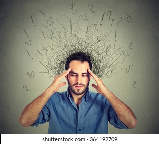 Closeup sad young man with worried stressed face expression and brain melting into lines question marks. Obsessive compulsive, adhd, anxiety disorders - Shutterstock ID 364192709