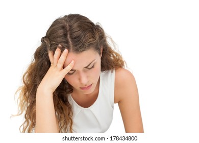 Close-up Of A Sad Young Woman Over White Background