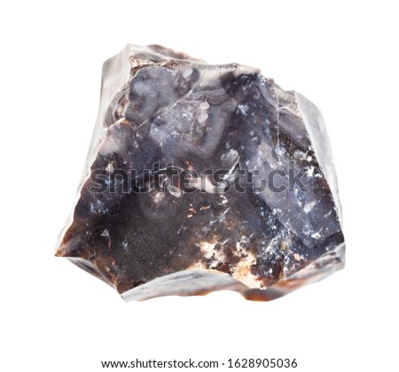 closeup of sample of natural mineral from geological collection - raw black Flint stone isolated on white background