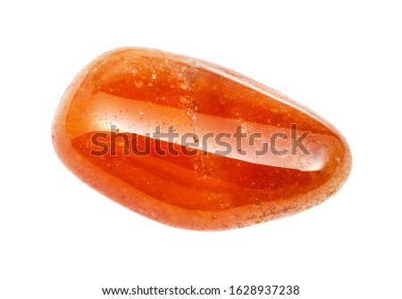 closeup of sample of natural mineral from geological collection - polished Spessartine (spessartite, garnet) gemstone isolated on white background