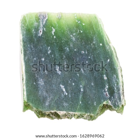 closeup of sample of natural mineral from geological collection - polished raw Nephrite (green jade) rock isolated on white background