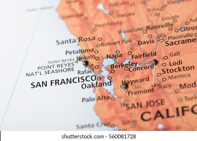 Closeup of San Fransisco, California and surrounding areas on a political map of the United States with pins in several cities.