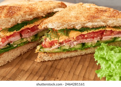 Close-up of the sandwiches. Appetizing sandwiches on a wooden board.  - Powered by Shutterstock