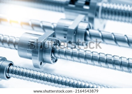 Closeup scene  assembly of spare parts  lead ball screw set. The hi-precision CNC machine part manufacturing concept.