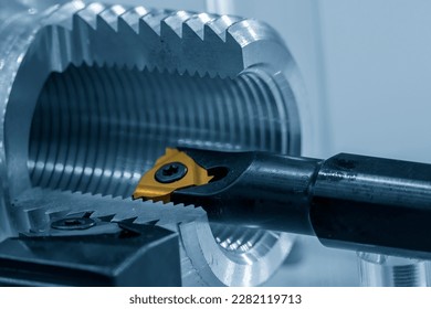 Closeup scene cutaway the inside thread tapping by special tool. The metal working process by tapping tool. - Shutterstock ID 2282119713