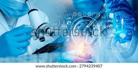 Close-up of scientists using a microscope, pipette, and test tube with holographic medical icons, illustrating laboratory diagnostics, biotech innovation, and futuristic healthcare research.