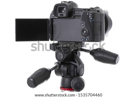 Close-up of screen of modern black camera device isolated