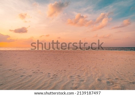 Closeup sea sand beach. Amazing empty beach landscape. Inspire tropical island seascape horizon. Orange golden purple sunset sunrise sky tranquil sunlight. Summer vacation travel holiday copy space