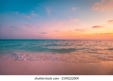 Closeup sea sand beach. Panoramic beach landscape. Inspire tropical seascape horizon. Orange and golden sunset sky clouds. Tranquil relaxing freedom beach shore happy romantic meditation summer nature