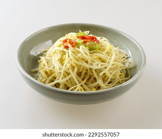 Close-up of seasoned bean sprouts with red pepper and green onion on a dish, South Korea
