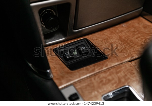 Close-up of seat heating buttons. modern car\
interior: parts, buttons,\
knobs\
