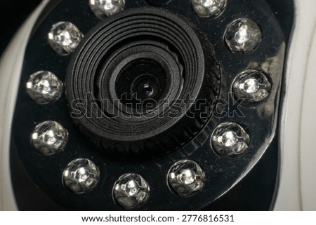 Closeup of security camera lens surrounded by infrared leds surveillance technology device for monitoring safety and protection in indoor or outdoor setting