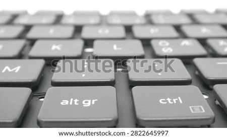 Close-up selective focus macro view of modern black computer keyboard keys showing Alt Gr and Ctrl buttons