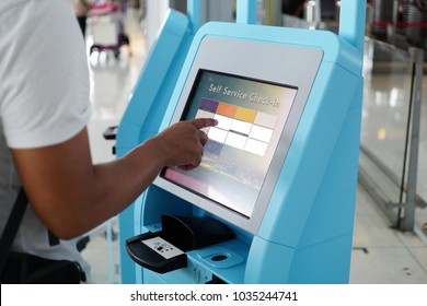 Close-up Self Service Check In For Flight Or Buying Airplane Tickets At Airport