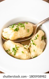 Closeup Of Semolina Dumplings In Broth