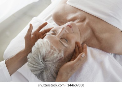 Closeup Of A Senior Woman Receiving Massage At Spa