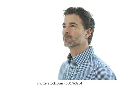 Close-up Of A Serious Handsome Man Isolated On White. Looking Away