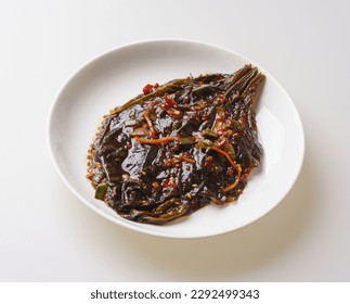 Close-up of Sesame Leaf Kimchi with sesame leaves and seasonings on white dish, South Korea
 - Shutterstock ID 2292499343