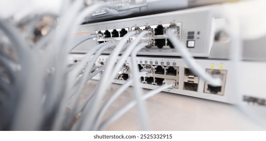 Close-up of set of cable network connected to internet switch servers in center. Control panel with wiring, electrical circuits. Provide internet concept