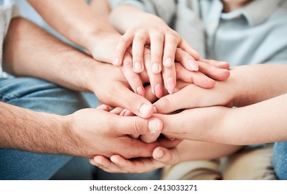 Close-up of several hands placed on top of one another in stack. All family members showing their support to each other. Concept of togetherness, unity, teamwork, family, solidarity, mutual support. - Powered by Shutterstock