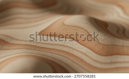 A close-up, shallow depth of field view of a smooth, undulating surface with layered patterns resembling wood grain or a topographic map in warm, earthy colors.