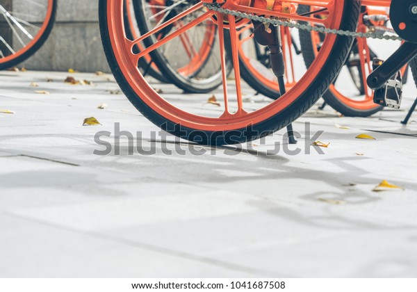 closeup of a
shared bicycle parked on
sidewalk
