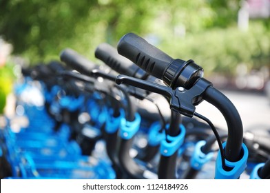 Close-up Of The Shared Bike's Handlebar.China's Bike Sharing Boom In Charts.Shared Bikes Putted On The Street, Jiangmen, Guangdong, China.