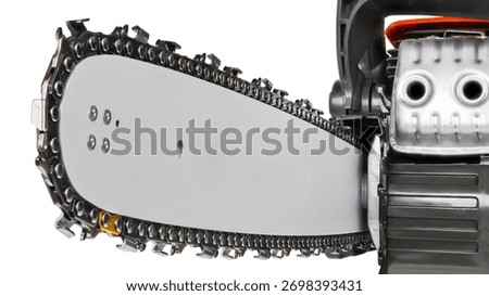 Closeup of sharp cutting teeth on chainsaw guide bar isolated on white background. Replaceable chain on gray alloy steel blade and combustion engine exhaust in sawing machine detail. Woodworking tool.