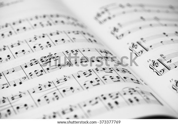 Closeup of Sheet Music. Musical Notes with\
Selective Focus.