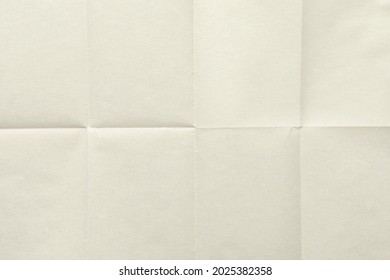 Close-up Of Sheet Paper Folded In Eight, Texture Background